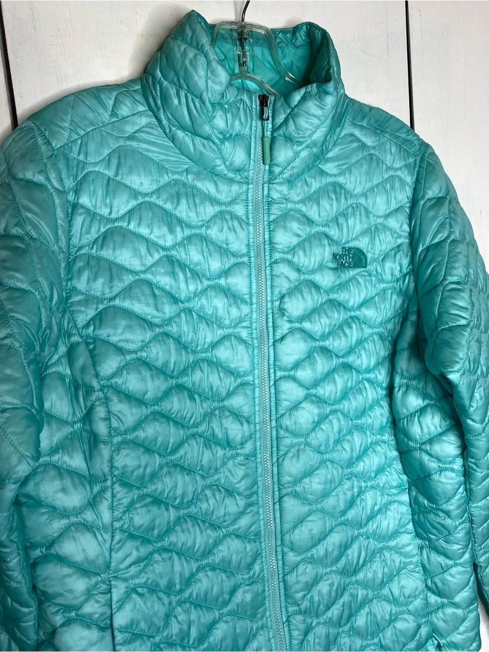 The North Face zip up puffer jacket size large